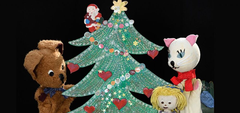 Hündchen und Kätzchen feiern Weihnachten